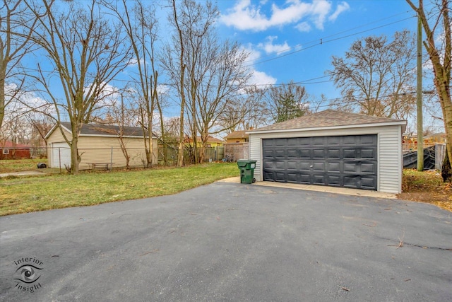 garage featuring a yard