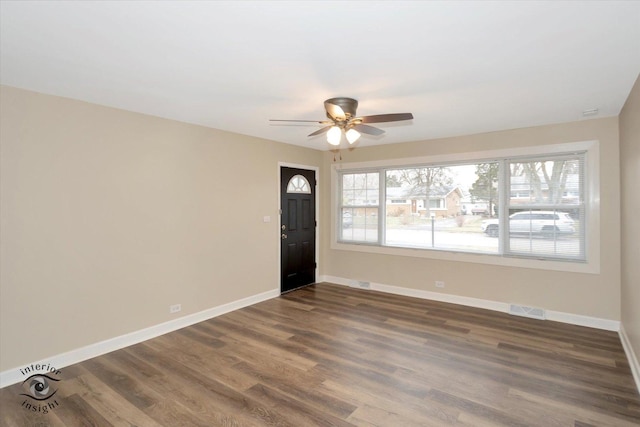 foyer entrance featuring dark hardwood / wood-style flooring and ceiling fan