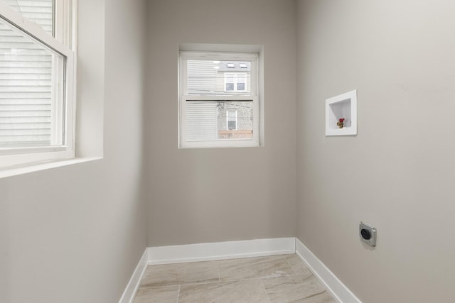 washroom featuring hookup for an electric dryer and hookup for a washing machine