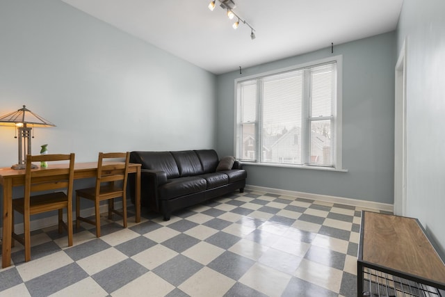 living room featuring track lighting