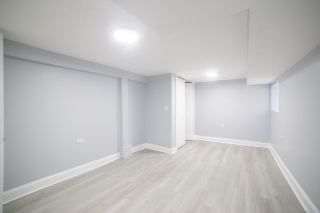 basement with light wood-type flooring