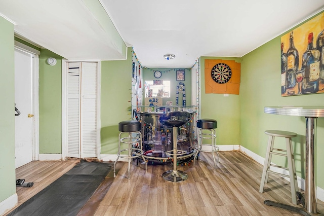 bar featuring wood-type flooring