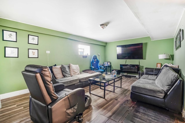 living room with dark hardwood / wood-style flooring