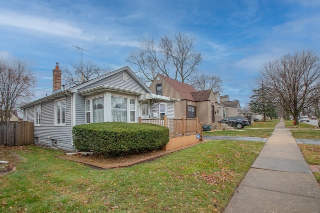 view of front of property with a front lawn