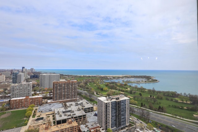 view of urban area with a large body of water