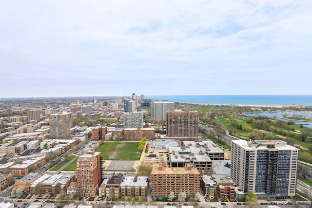 view of urban area featuring a nearby body of water