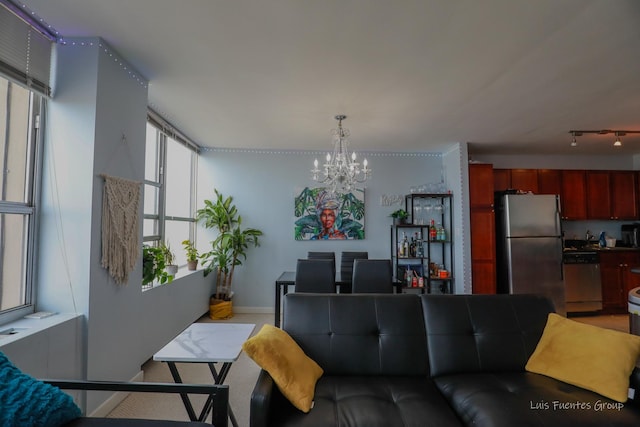 living room with a notable chandelier