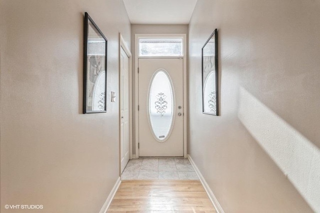 doorway to outside featuring light hardwood / wood-style flooring