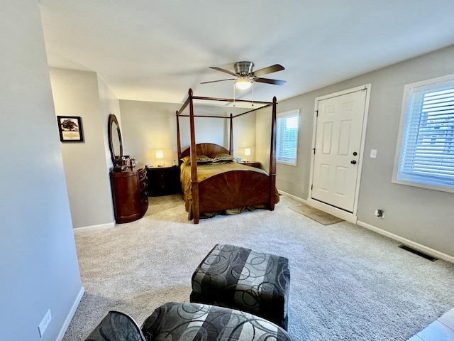 carpeted bedroom featuring ceiling fan