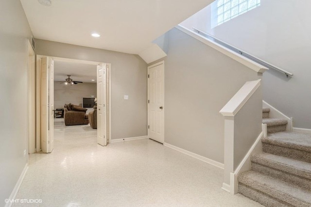 stairs with ceiling fan