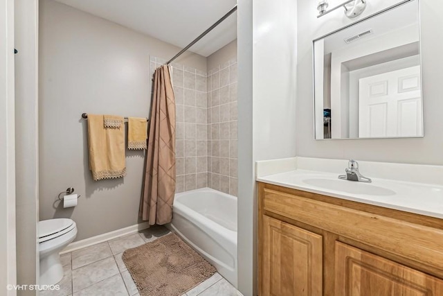 full bathroom with toilet, vanity, tile patterned floors, and shower / bath combo with shower curtain