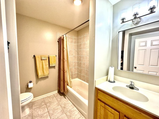 full bathroom featuring toilet, shower / bath combo with shower curtain, tile patterned floors, and vanity