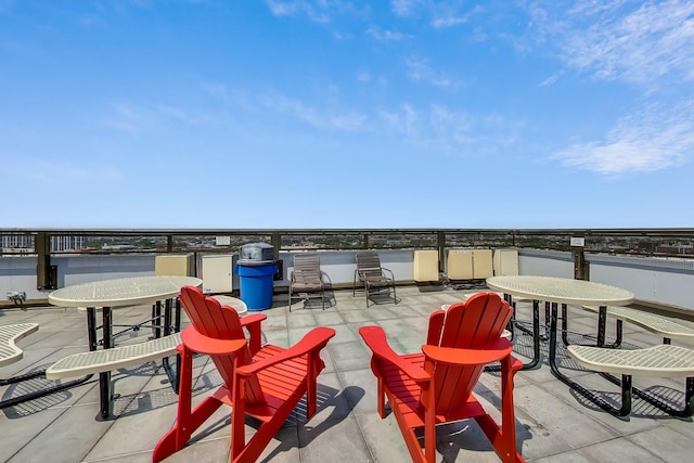 view of patio featuring a water view