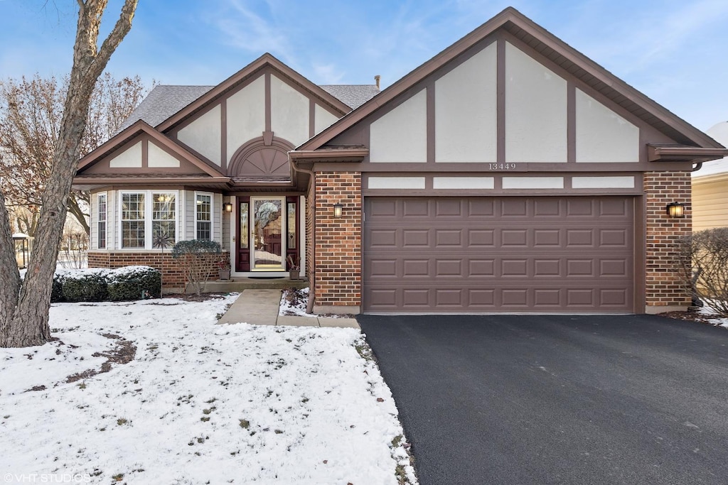 tudor home with a garage