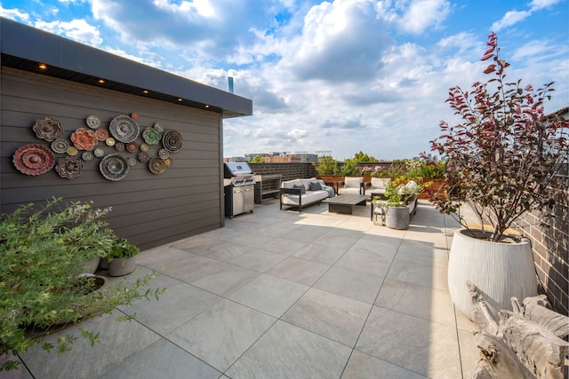 view of patio / terrace featuring area for grilling and an outdoor hangout area