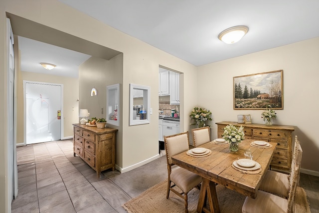 view of tiled dining space