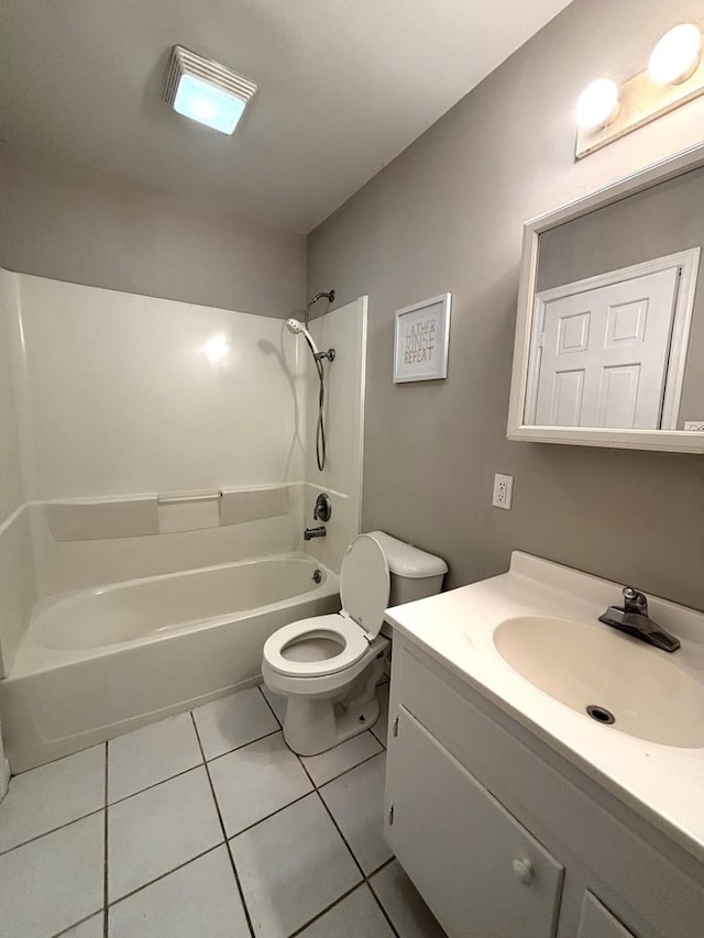 full bathroom featuring tile patterned floors, vanity,  shower combination, and toilet