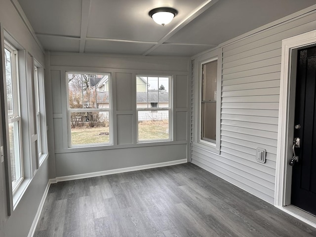 unfurnished sunroom with coffered ceiling