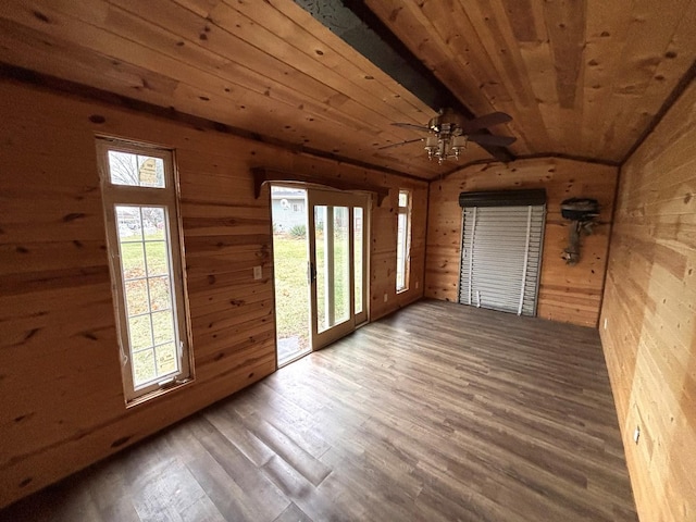 interior space featuring ceiling fan, wood ceiling, and lofted ceiling