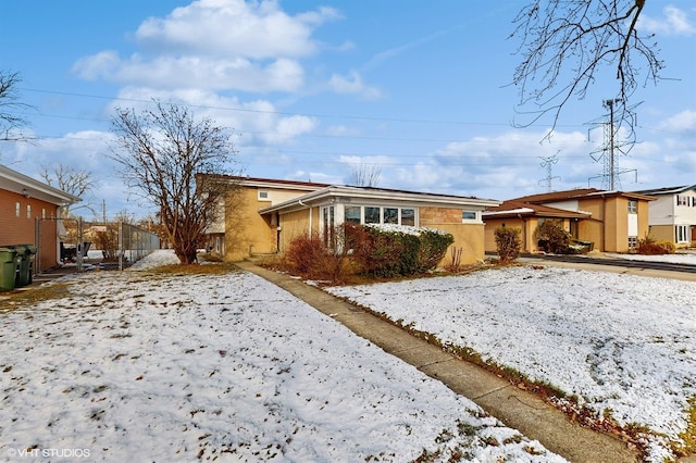 view of snow covered property