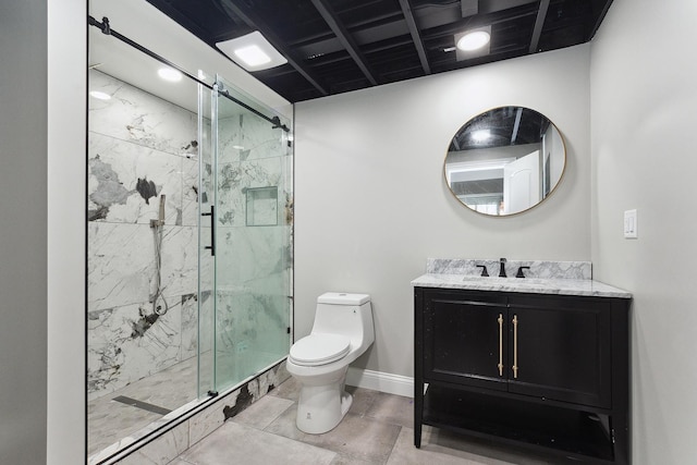 bathroom featuring vanity, an enclosed shower, and toilet