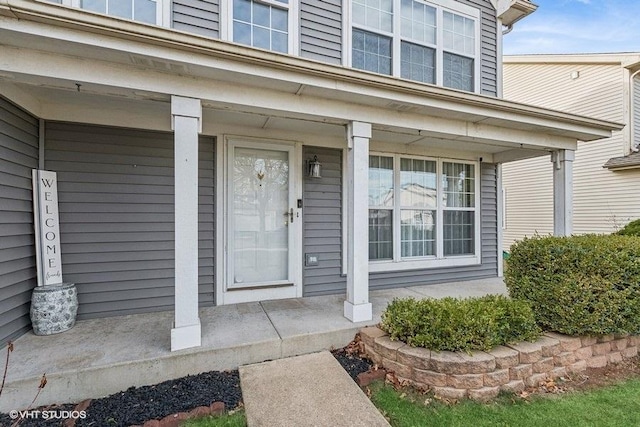 doorway to property with covered porch