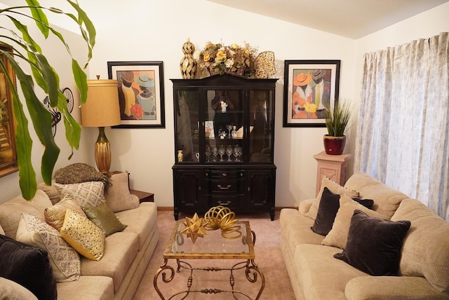 living room with light carpet and lofted ceiling