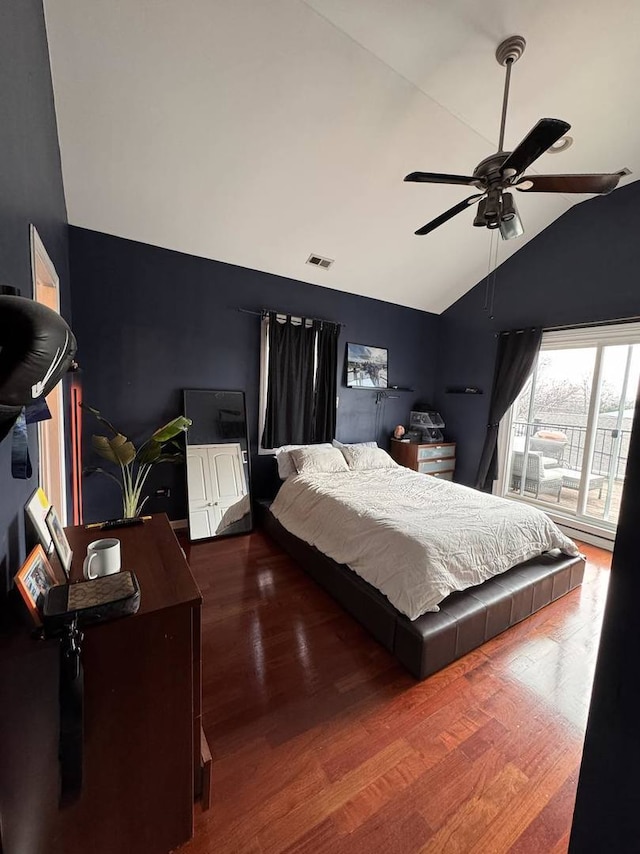 bedroom featuring hardwood / wood-style flooring, vaulted ceiling, and ceiling fan