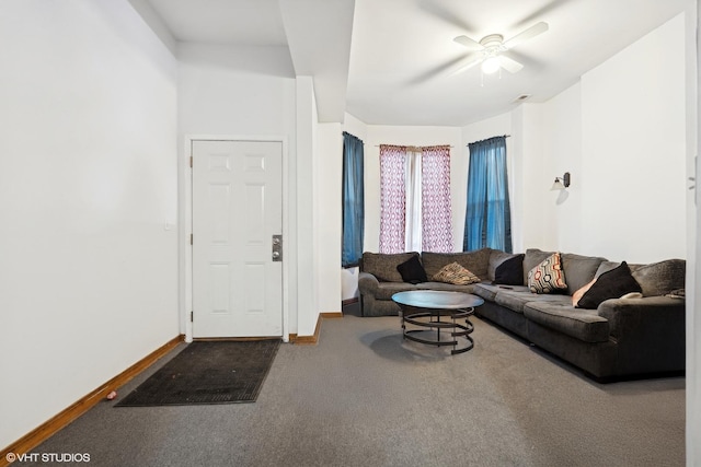 living room with carpet flooring and ceiling fan