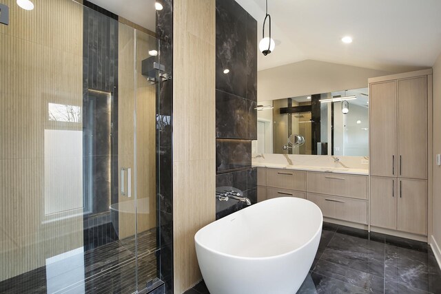 full bathroom featuring vanity, toilet, and tiled shower / bath