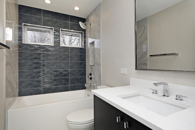 full bath featuring toilet, recessed lighting, tub / shower combination, and vanity