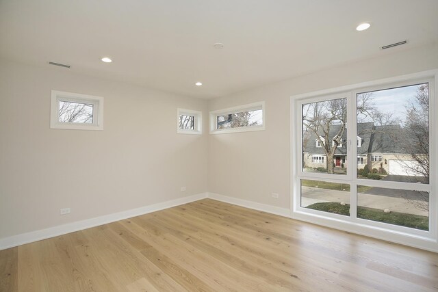 unfurnished living room with light hardwood / wood-style floors