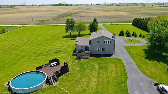 birds eye view of property featuring a rural view