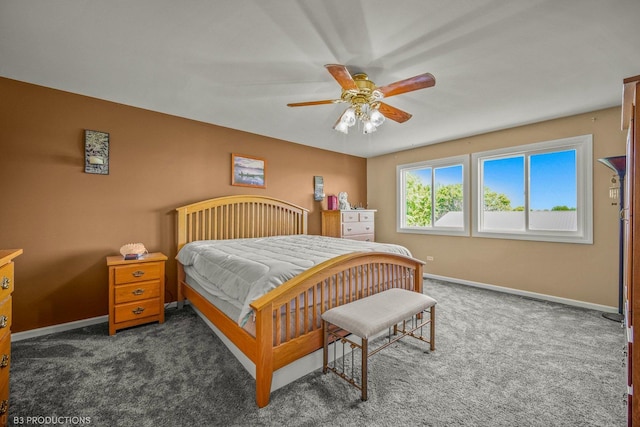 bedroom featuring dark carpet and ceiling fan