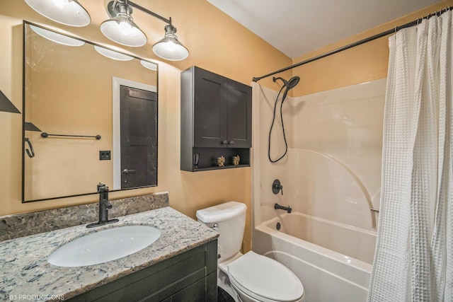 full bathroom featuring vanity, shower / bathtub combination with curtain, and toilet