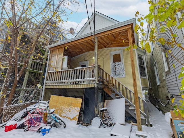 view of snow covered property