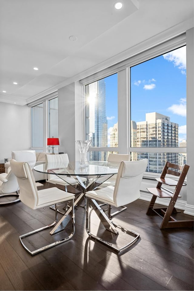 dining area with hardwood / wood-style flooring