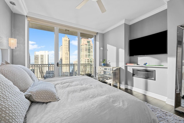 bedroom featuring access to outside, ceiling fan, hardwood / wood-style floors, and crown molding