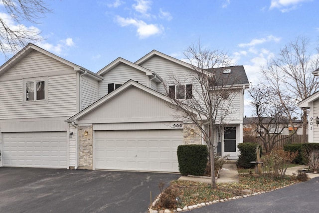 front of property with a garage