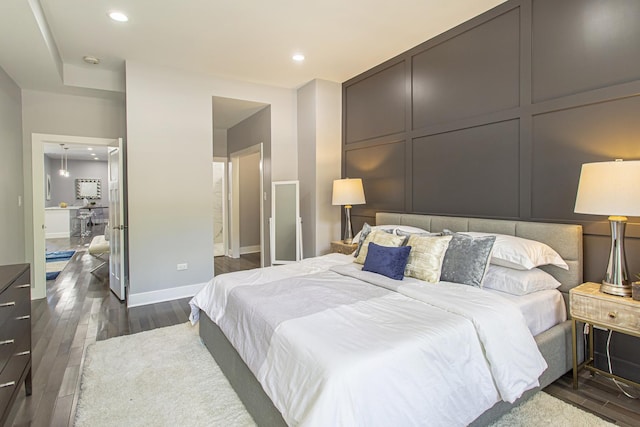 bedroom with dark wood-type flooring