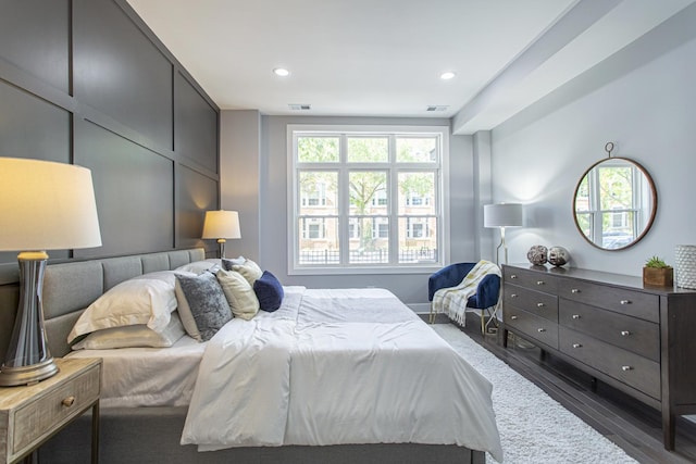 bedroom featuring dark hardwood / wood-style floors