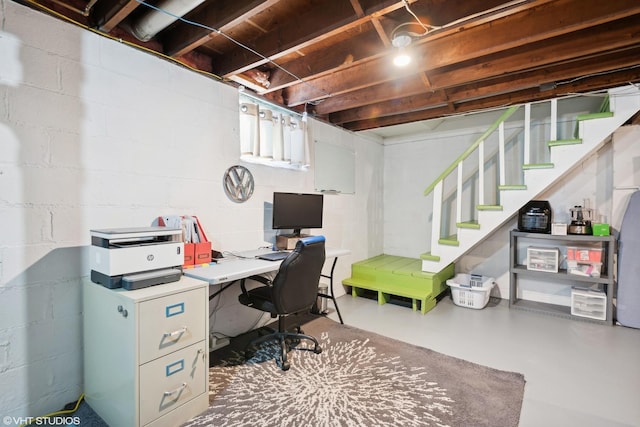 office area featuring concrete flooring