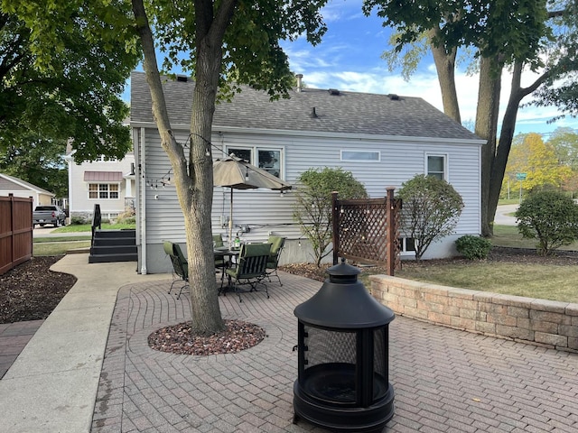 back of house featuring a patio