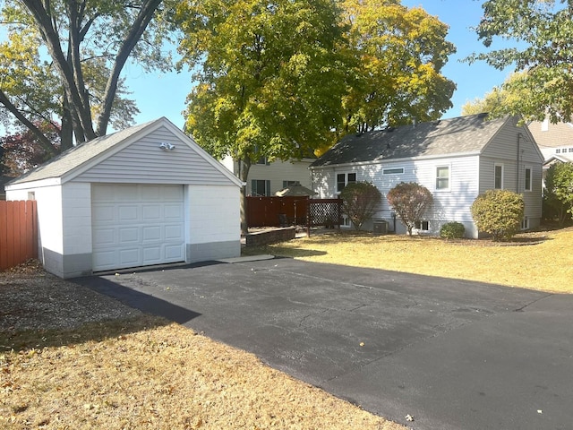 view of front facade with a garage and an outdoor structure