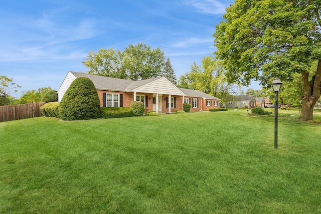 ranch-style house with a front yard