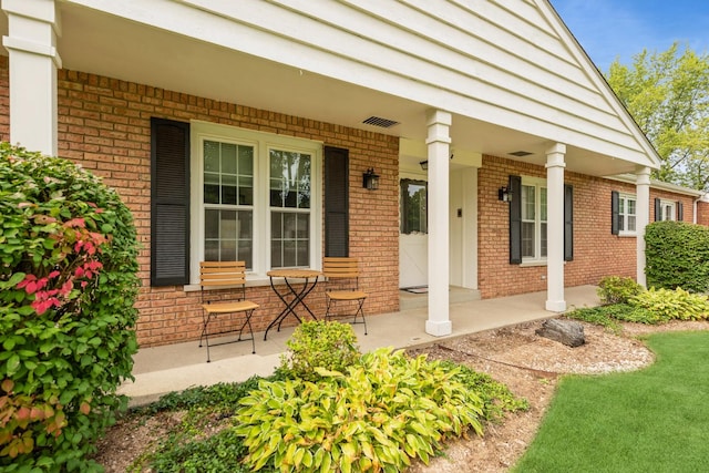 entrance to property with a porch