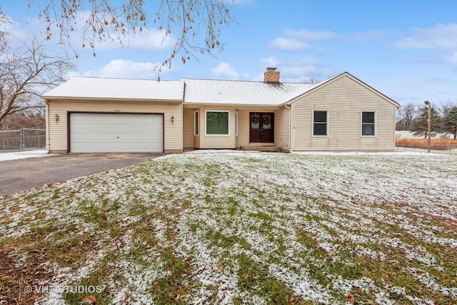 single story home with a garage