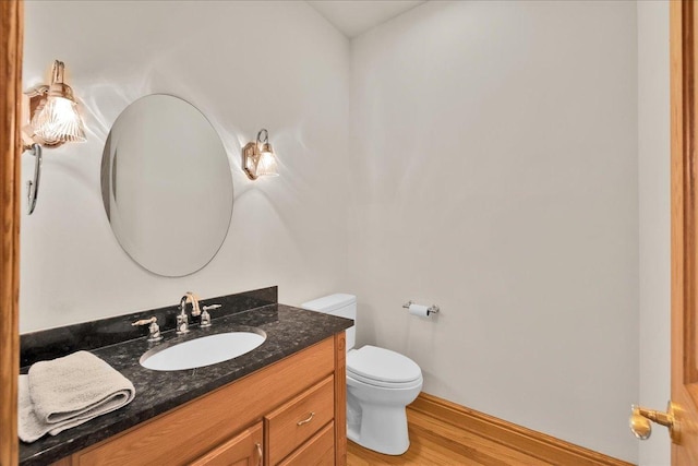 16001 Burr Oak Dr, Huntley, IL 60142 - half bath with wood finished floors, toilet, and vanity