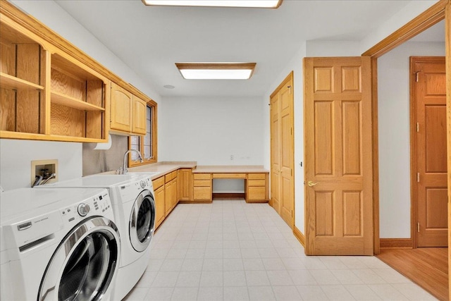 16001 Burr Oak Dr, Huntley, IL 60142 - washroom featuring cabinet space, washer and clothes dryer, and baseboards