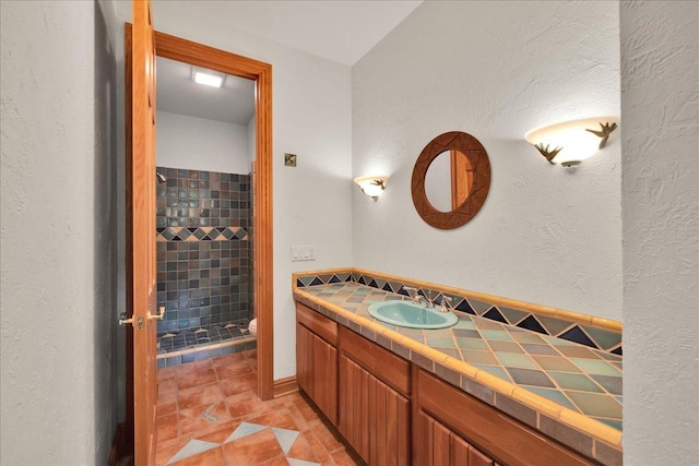 16001 Burr Oak Dr, Huntley, IL 60142 - bathroom with a stall shower, vanity, toilet, and a textured wall